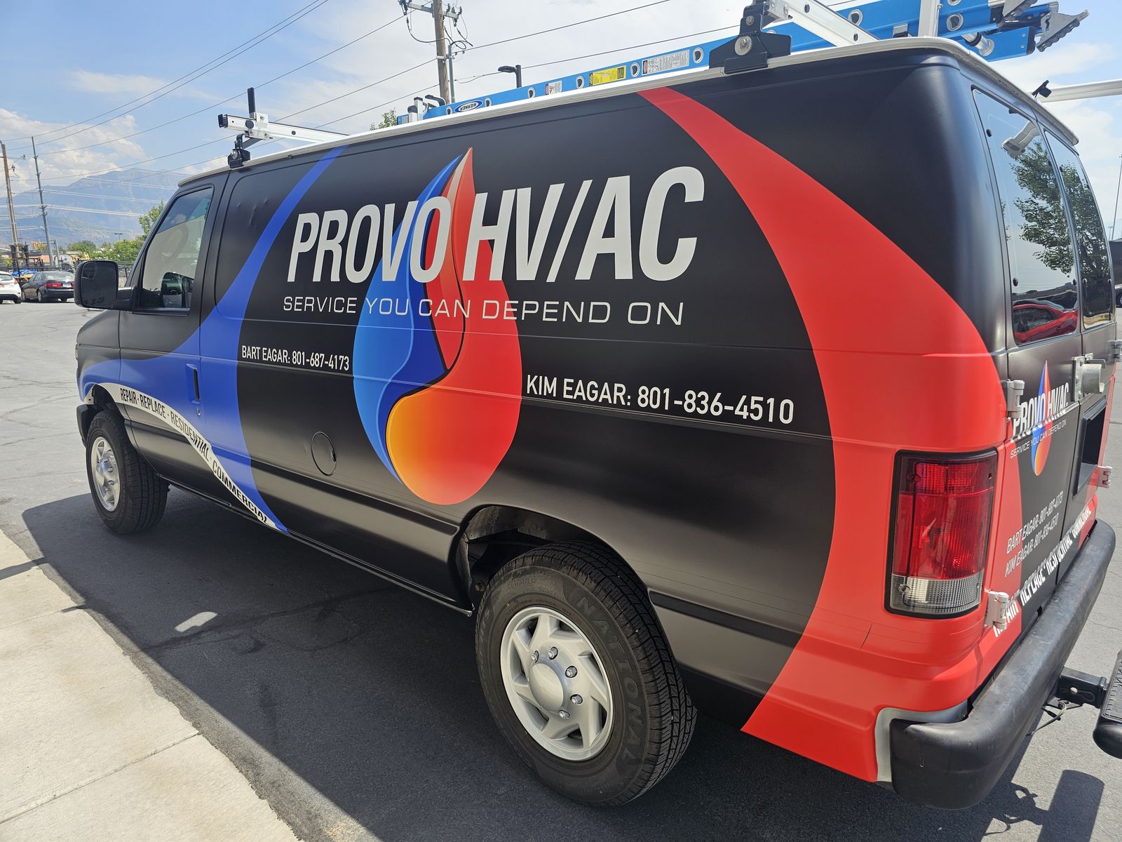 Provo HVAC wrapped service van on a Utah County street with mountains behind